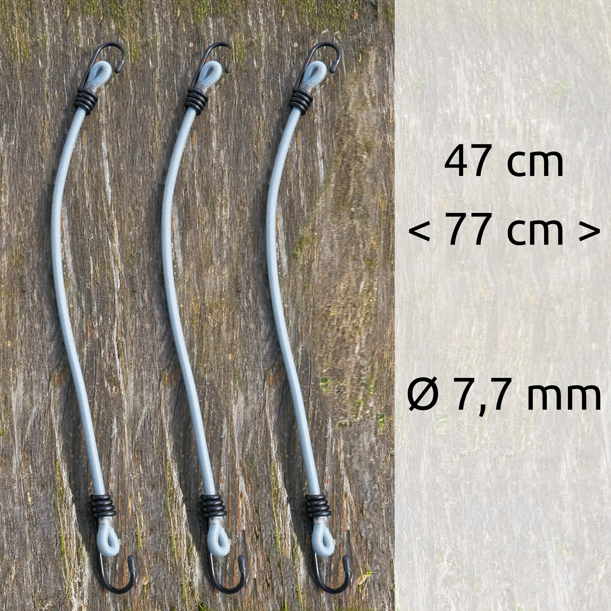Drei graue Spanngummis mit Haken, je 47 cm lang, dehnbar bis 77 cm, Durchmesser 7,7 mm, auf Holzoberfläche – Zubehör für your GEAR Caravan Bugschutzplane Thermo 145 x 160 cm.