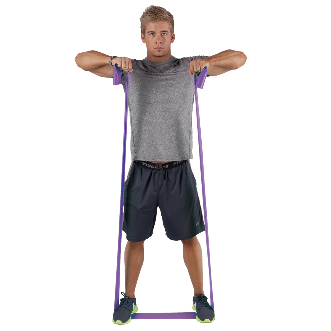 Man exercising with Spirit Fitnessband 18 kg, latex-free resistance band, 183x10 cm, purple color, standing on the band and pulling it upward. Ideal for strength training and rehabilitation exercises.