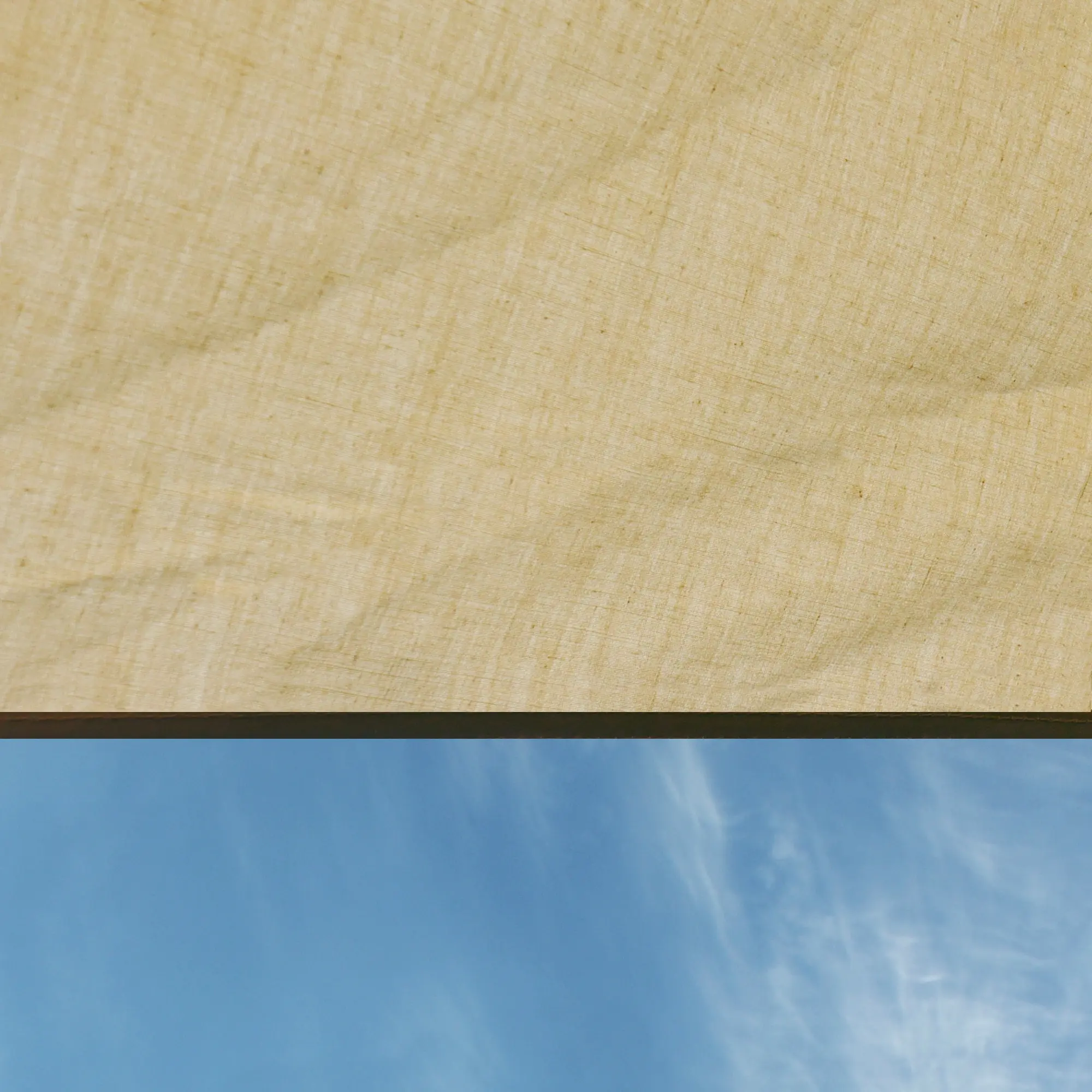 Auvent your GEAR pour camping-car, toile coton beige 260 x 240 cm, protection solaire, vue sur tissu résistant et ciel bleu en arrière-plan, idéal pour bus, van ou voiture.