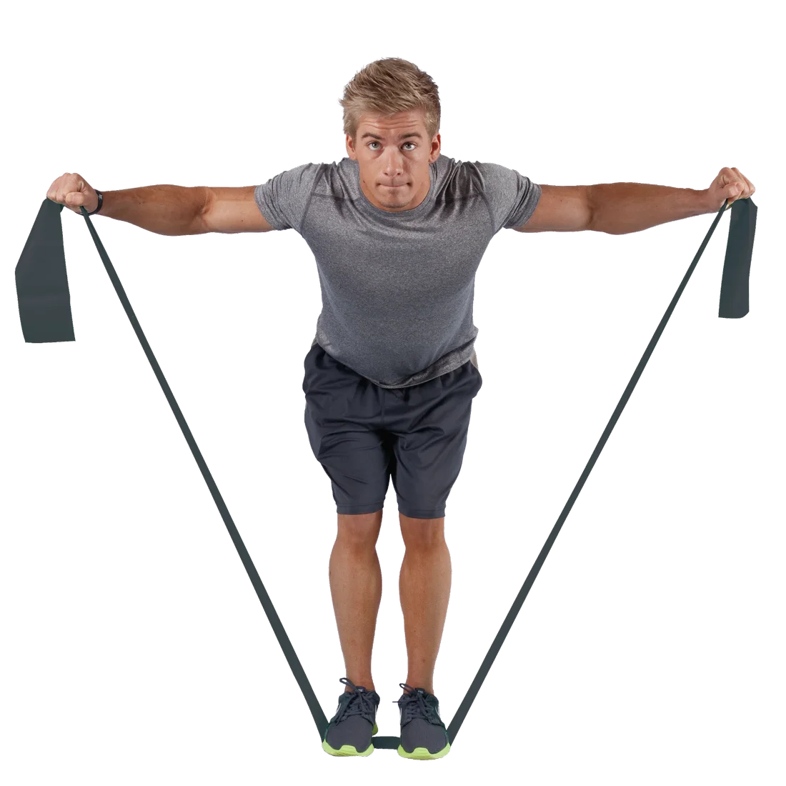 Man exercising with Spirit Fitnessband 27 kg resistance band, latex-free, 183x10 cm, holding both ends and standing on the band for strength training, wearing sportswear. Fitness accessory for versatile workouts.