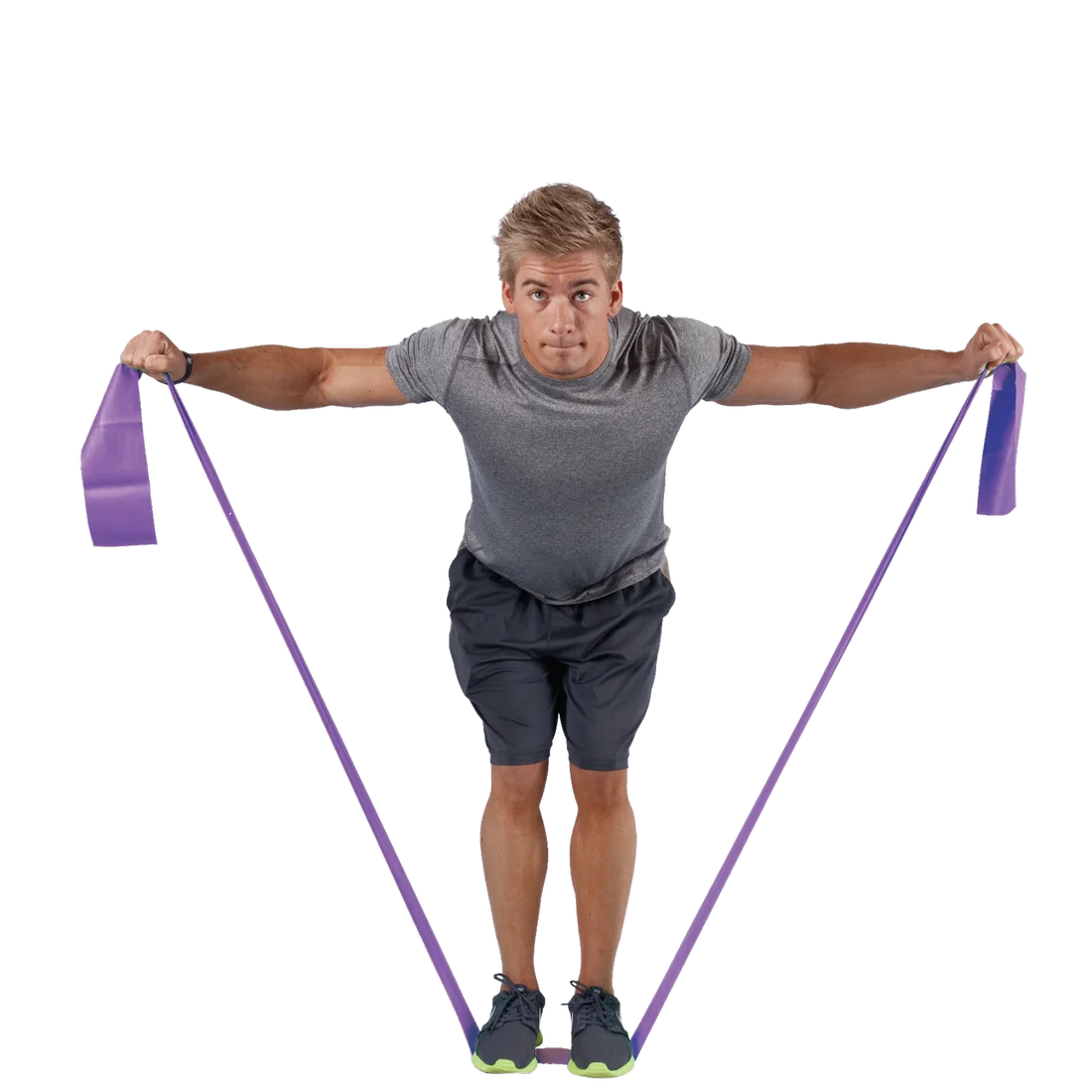 Man exercising with Spirit Fitnessband, 183x10 cm, purple, latex-free resistance band with 18 kg tension; shown in use for strength training, stretching between hands and under feet. Ideal for versatile fitness workouts.