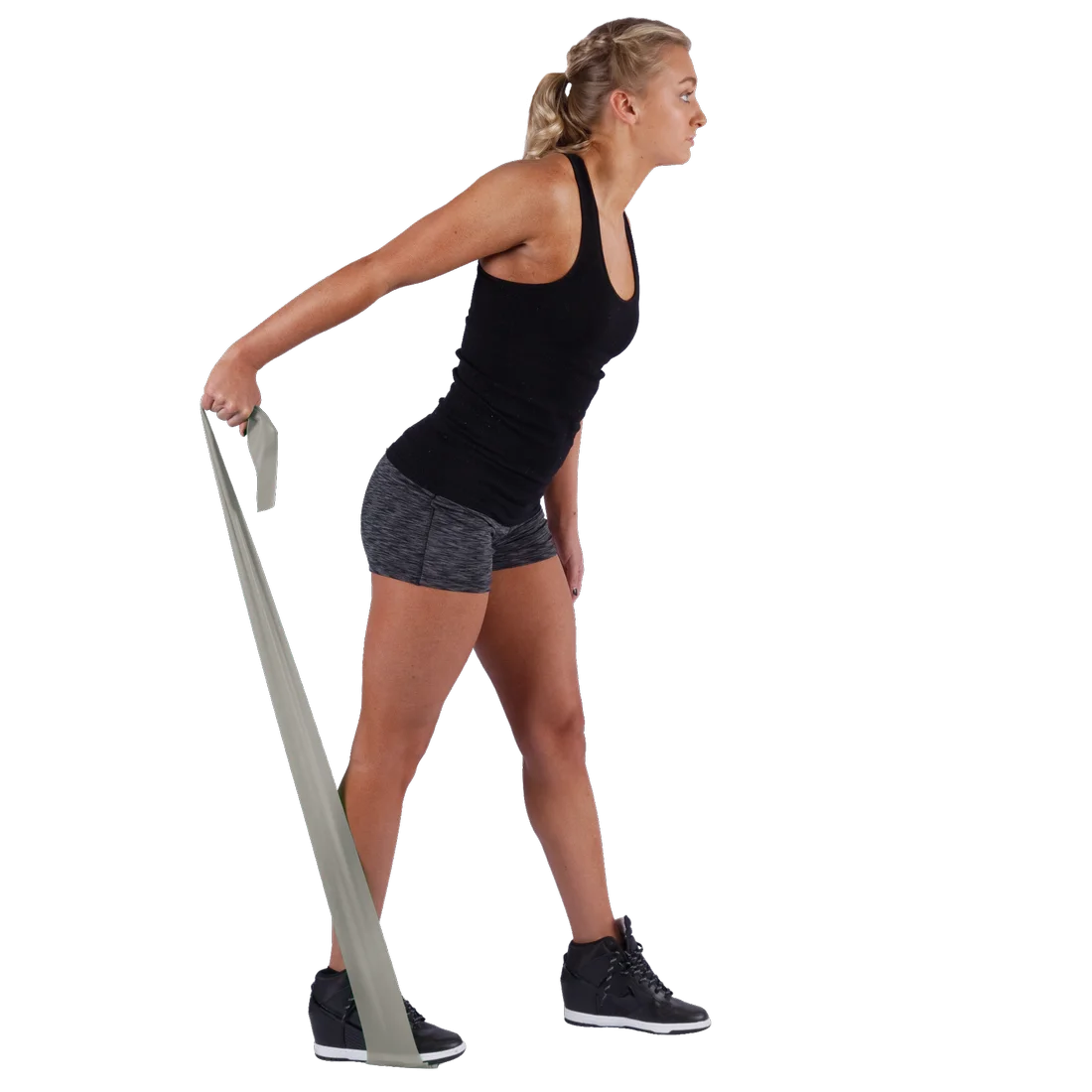 Woman exercising with a Spirit Fitnessband, latex-free resistance band, 183x10 cm, 22.5 kg strength, grey color, used for strength training and rehabilitation. Ideal for full body workouts.