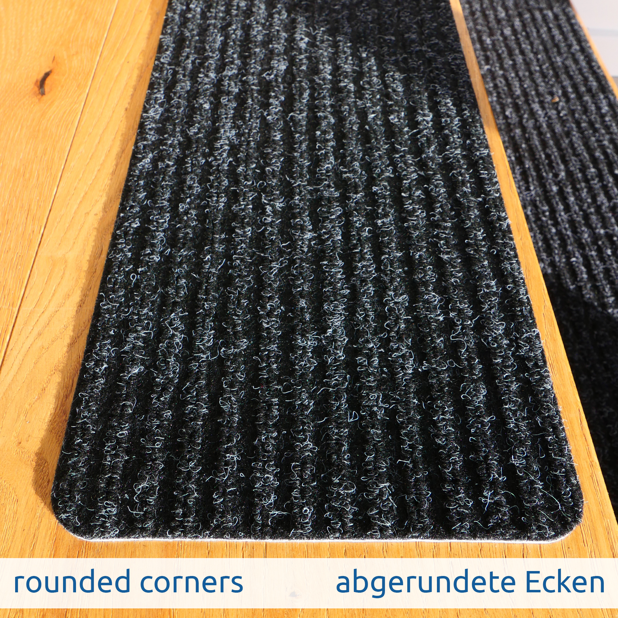 yourGEAR 15x self-adhesive grey stair mat, 76x20cm, with TPR anti-slip backing, ribbed surface and rounded corners, shown on a wooden staircase for safe and reusable stair protection.