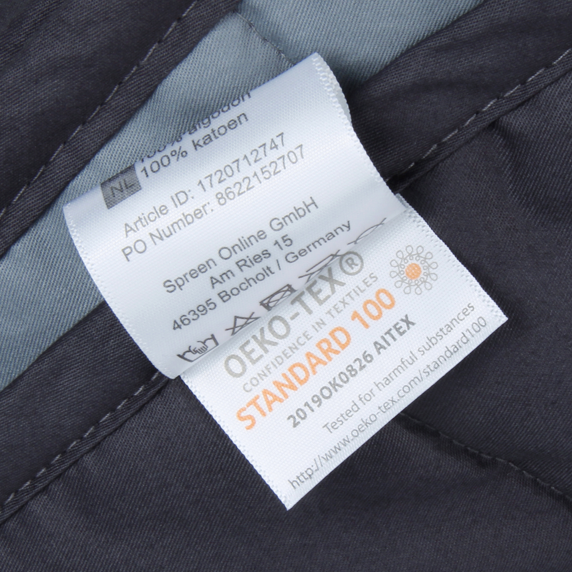 Etichetta della yourGEAR Como 6 kg Gewichtsdecke in cotone, 135x200 cm, che mostra la certificazione OEKO-TEX Standard 100 e le informazioni sulla composizione e il produttore.