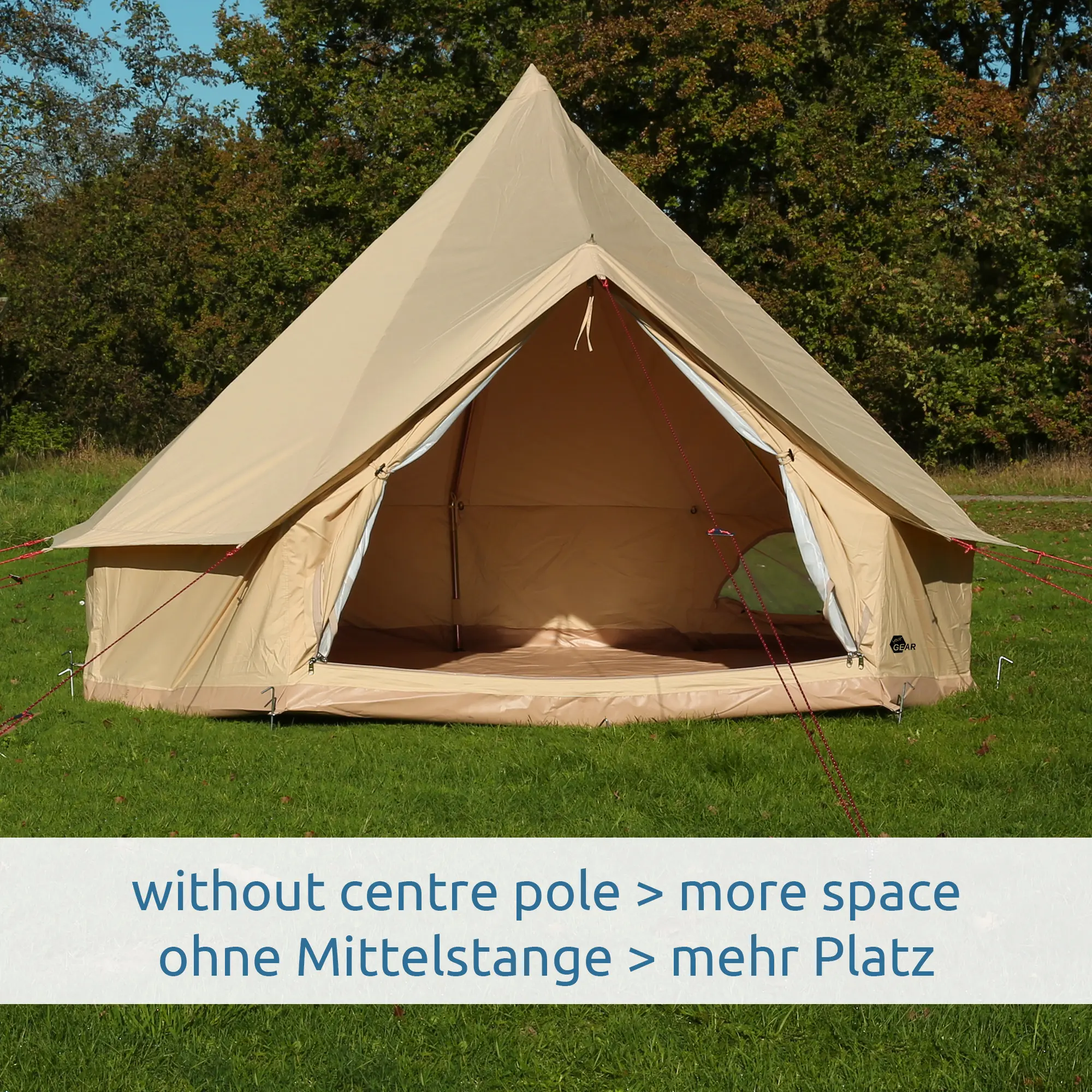 your GEAR Gobi 3 tipi tent, beige cotton blend, UV50+ protection, no centre pole for extra space, A-frame entrance, mesh windows, pitched on grass with open front showing spacious interior.