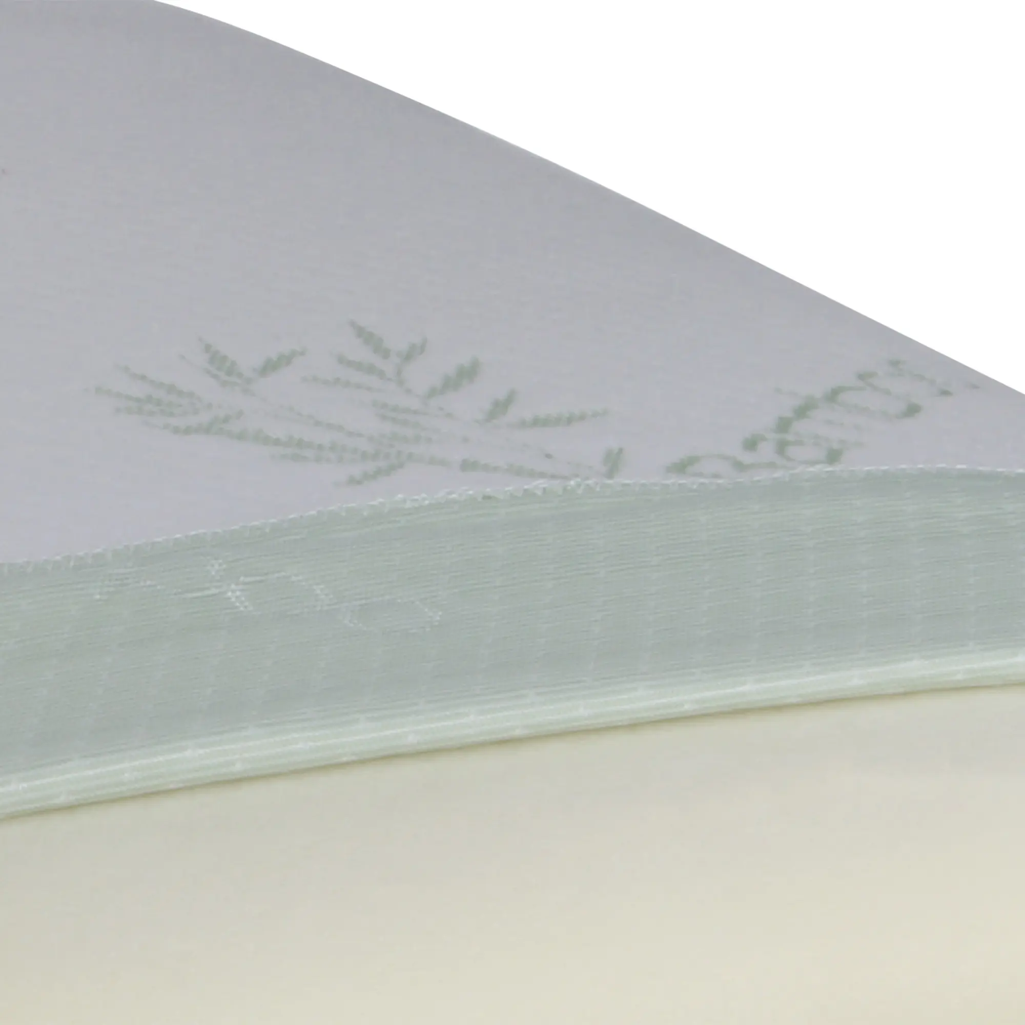 Close-up of yourGEAR Bamboo Memory Foam Pillow, showing the hypoallergenic bamboo cover with subtle leaf pattern and the ergonomic viscoelastic foam core, designed for neck support and healthy sleep.