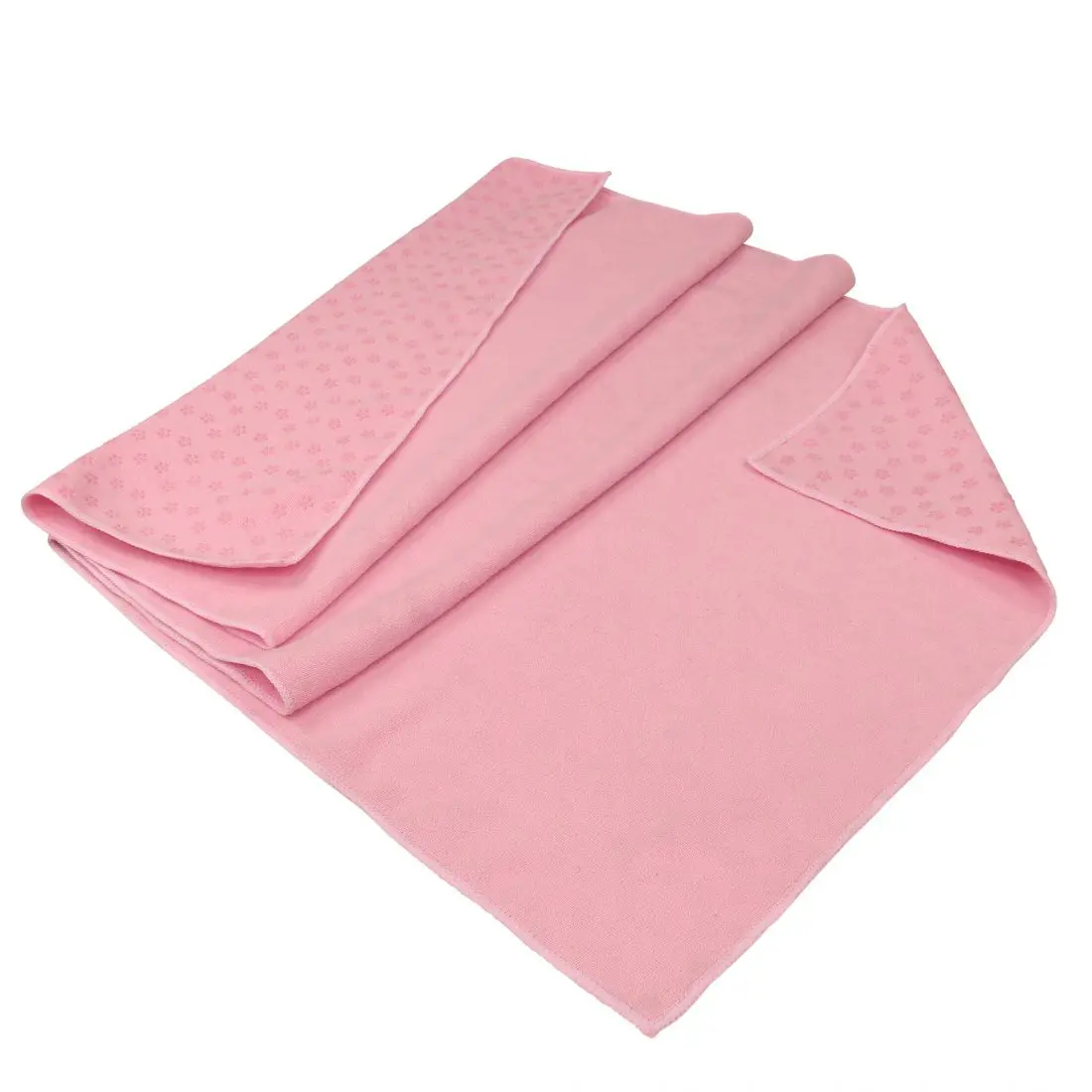 Toalla de yoga rosa Carnegie 180x60 cm de microfibra, antideslizante con nódulos de silicona en la parte inferior, ideal como base para yoga, pilates o fitness en casa.