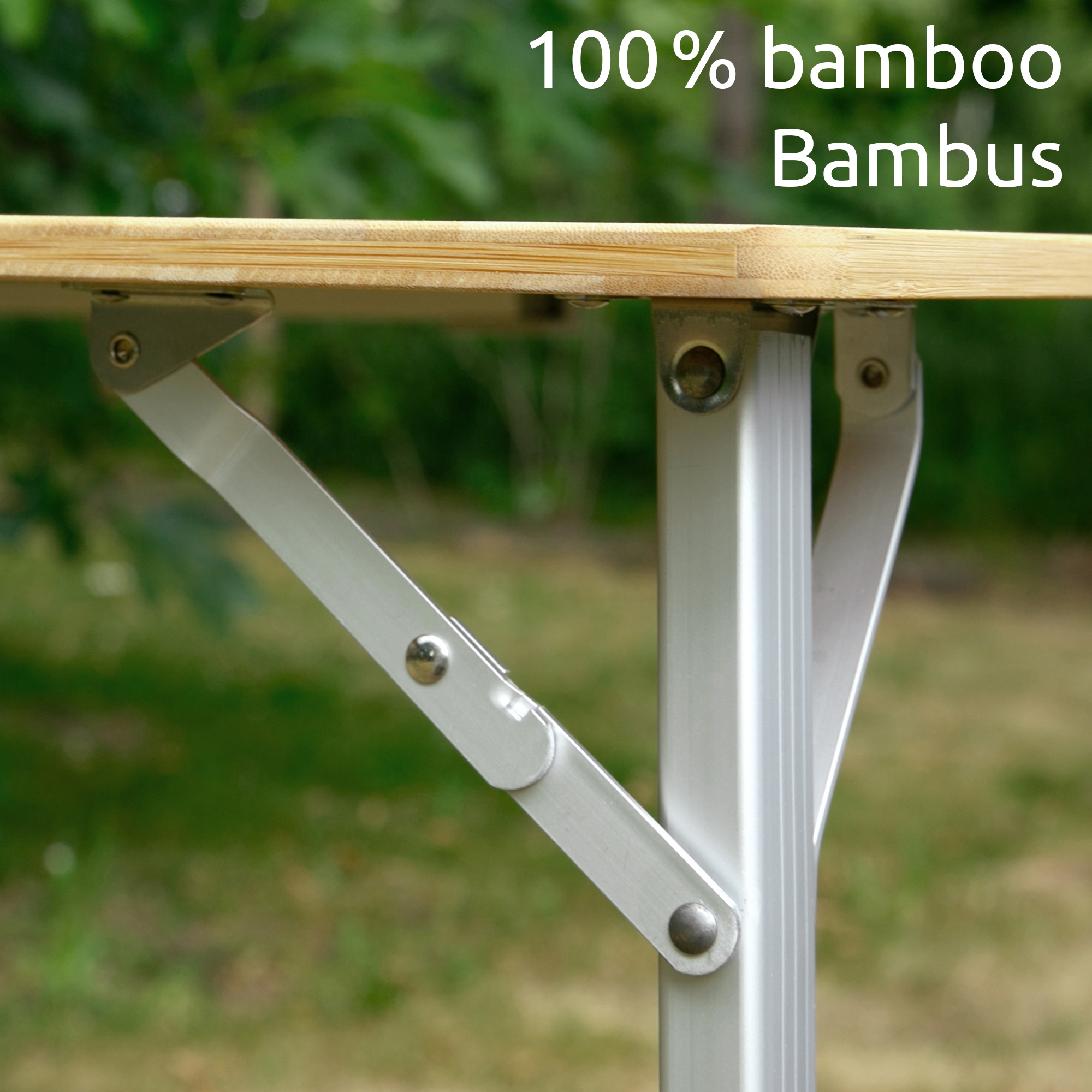 Close-up of the your GEAR Portofino L bamboo camping table showing the 1.2 cm thick natural bamboo tabletop and sturdy, height-adjustable metal legs; suitable for outdoor use, UV-resistant and waterproof.