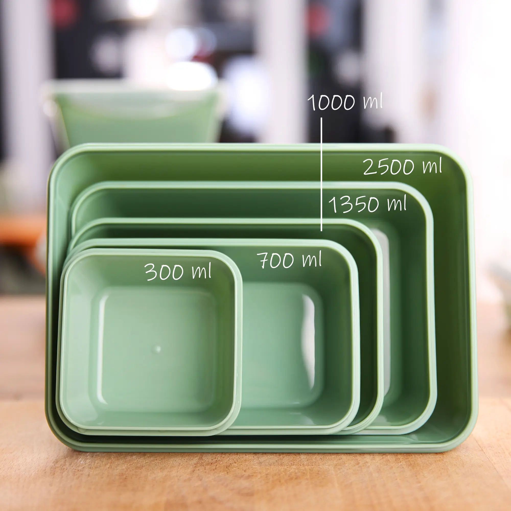 Set of 6 green your GEAR Pila food storage containers, each with a 700 ml capacity, shown nested for stackable storage; BPA-free, durable, suitable for fridge, freezer, microwave, and dishwasher.