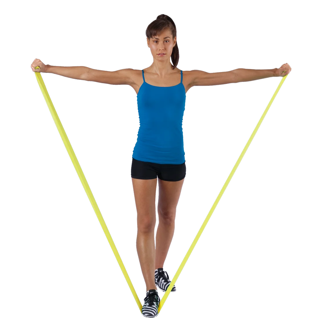 Woman exercising with Spirit Fitness Band 9 kg, latex-free, yellow resistance band, 183x10 cm, stretched under her feet and held in both hands, demonstrating fitness training use.