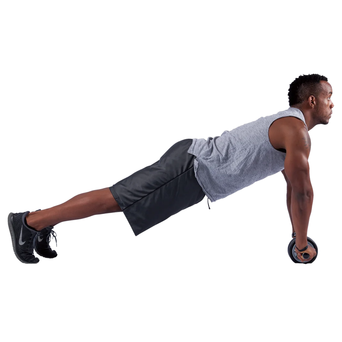 Homme utilisant le Spirit Dual Wheel Ab Toner, un rouleau à double roue pour l’entraînement des abdominaux et du dos, en position de gainage sur sol, idéal pour le fitness à domicile ou en salle.