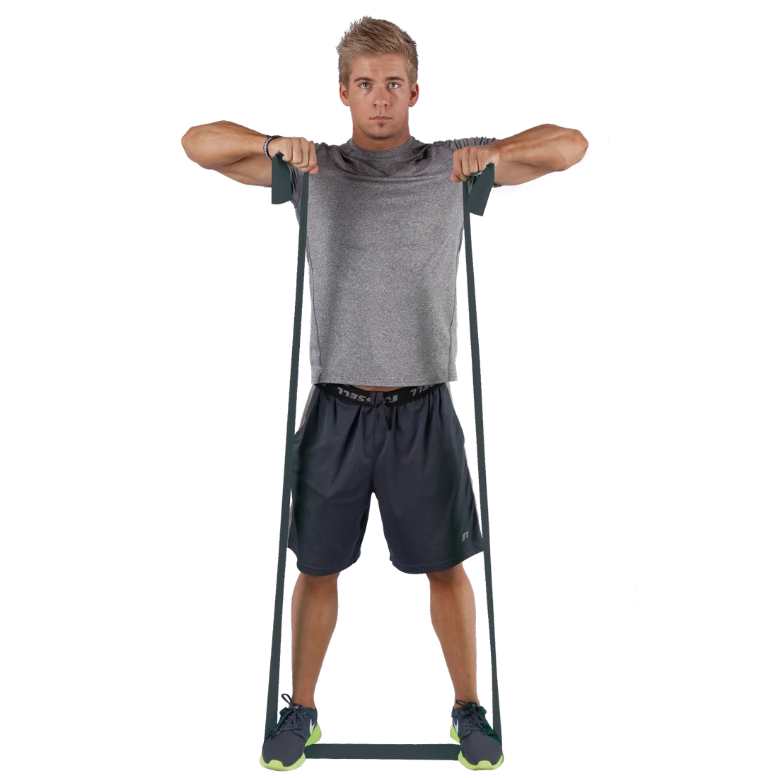 Man exercising with Spirit Fitnessband 27 kg, latex-free resistance band, 183x10 cm, black, stretching from feet to shoulders, ideal for strength and rehabilitation training. Suitable for home or gym workouts.
