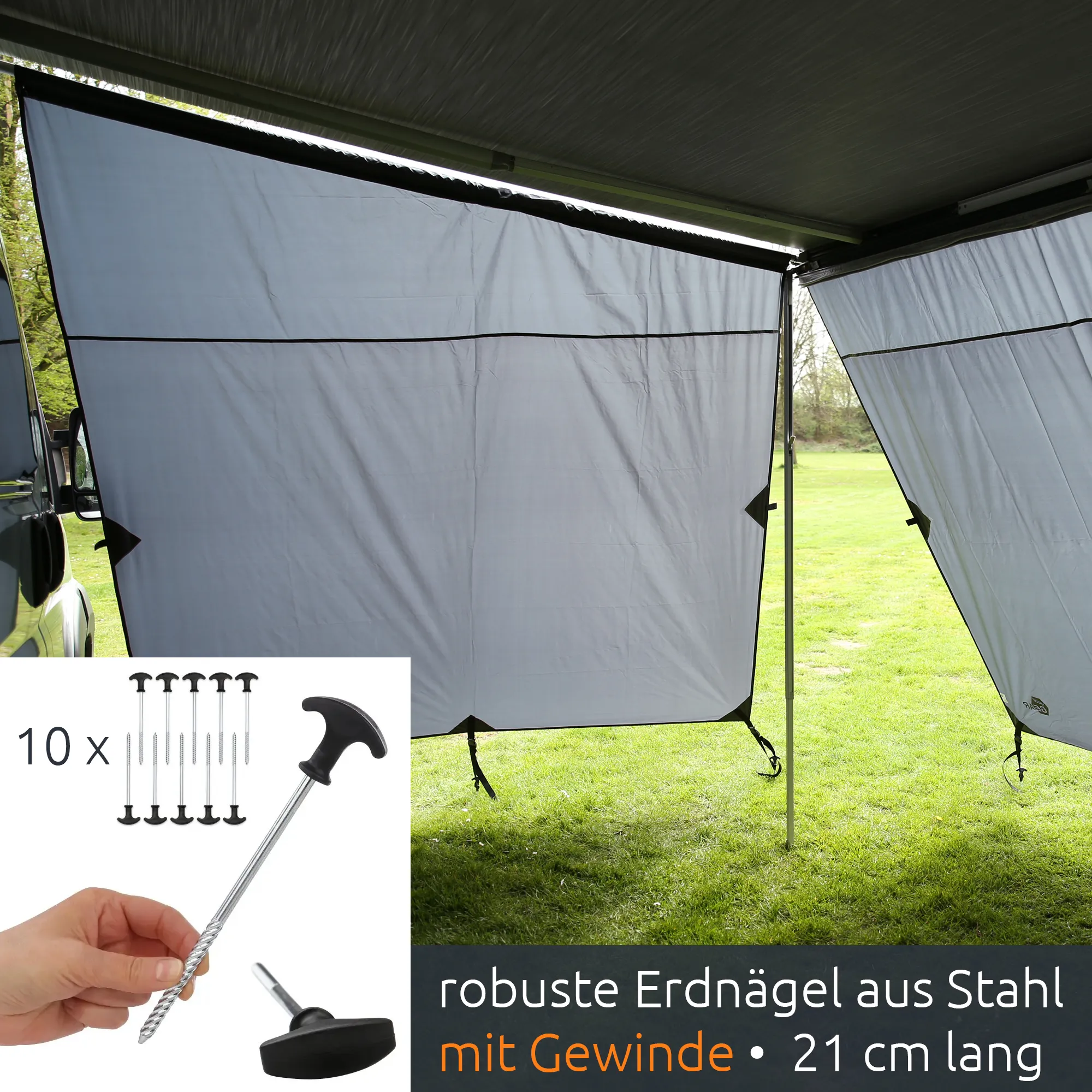 Gray your GEAR Korsika 2.4 awning front and two side walls attached to vehicle awning, weatherproof fabric panels with black trim, guyline straps and steel ground pegs shown (set of 10) for 240x200 cm front, 250 cm depth.