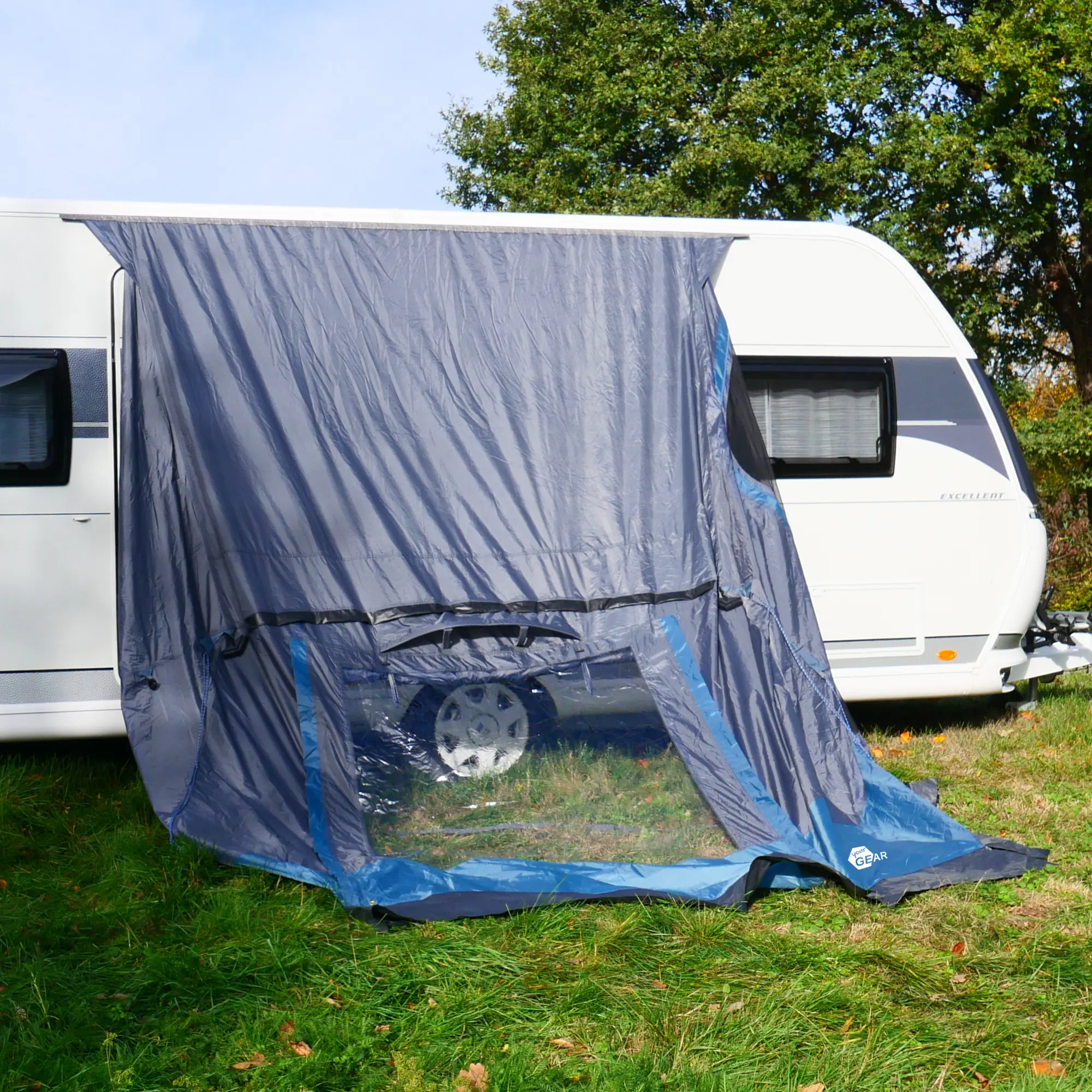 Avance de caravana your GEAR Pampero 280, color gris con azul, dos entradas, gran ventana frontal transparente, instalado en un caravan, material impermeable y resistente a rayos UV, ideal para camping.