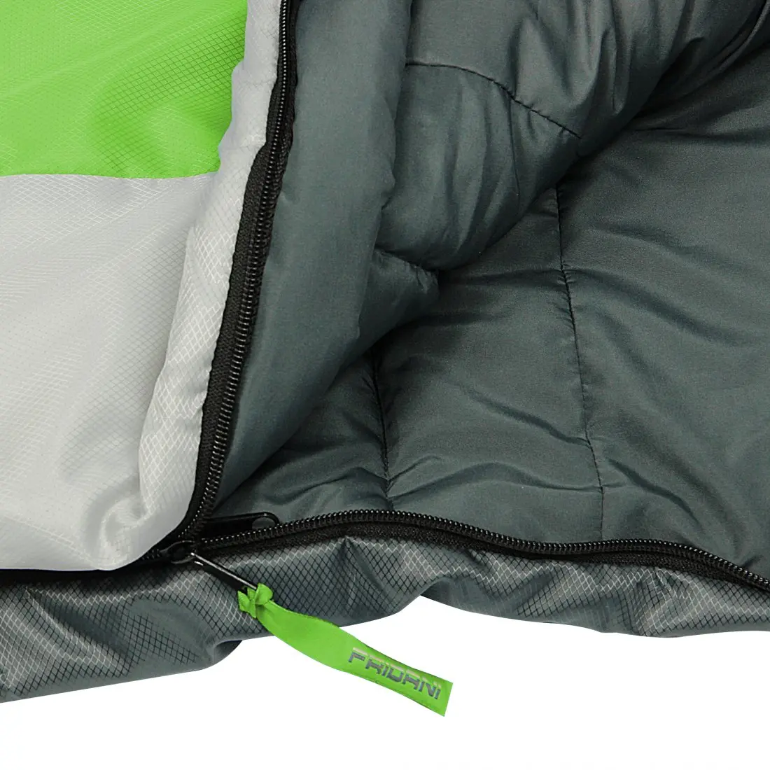 Close-up of a sleeping bag with a green and grey fabric, showing a black zipper and a green zipper pull tab.