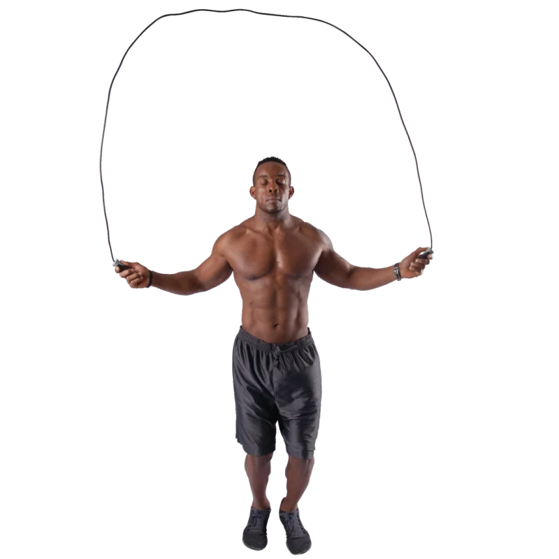 Muscular man skipping with the Spirit Speed Rope fitness jump rope, wearing black shorts and athletic shoes, demonstrating professional gym equipment for cardio, boxing, and daily workout training.