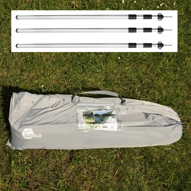 your GEAR Caravan Thermo Tarp 435x250 cm with UV80 protection, shown in a grey carry bag with three aluminum poles, ideal as a waterproof, lightproof awning for caravans.