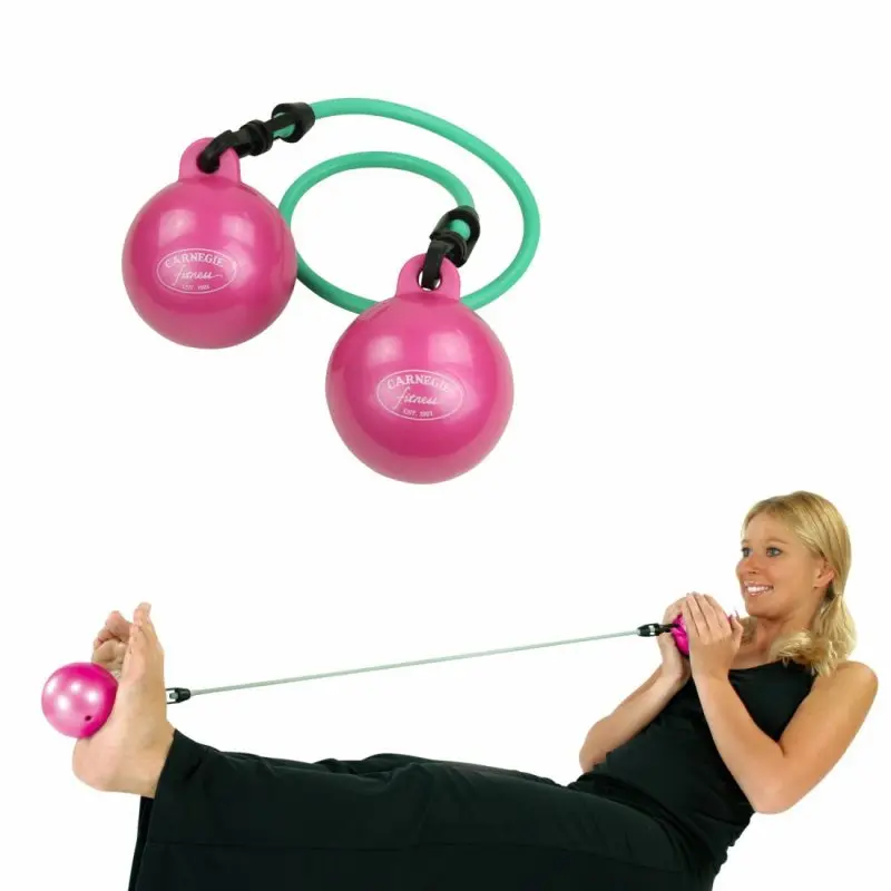 Carnegie Iso 2x Toning weighted balls with green fitness tube, pink color, used by a woman for full-body workout exercises; ideal for strength and resistance training for arms, legs, and core.