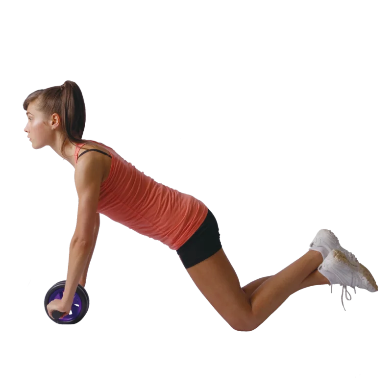 Woman using Spirit Carnegie Ab Toner Roller with dual wheels for ab and back muscle training, kneeling on the floor and gripping the handles, demonstrating home fitness exercise.