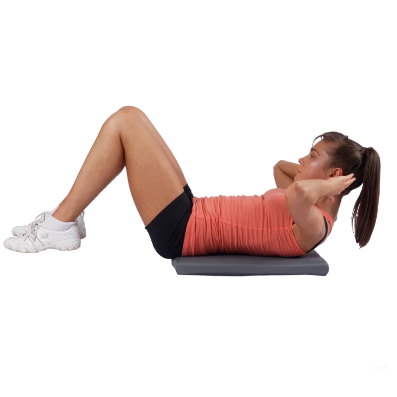 Donna che esegue esercizi su Spirit Balance-Block XL, cuscino per equilibrio 50x40x6 cm di colore grigio, ideale per fitness e yoga, supporto confortevole e antiscivolo per allenamento e stabilità articolare.