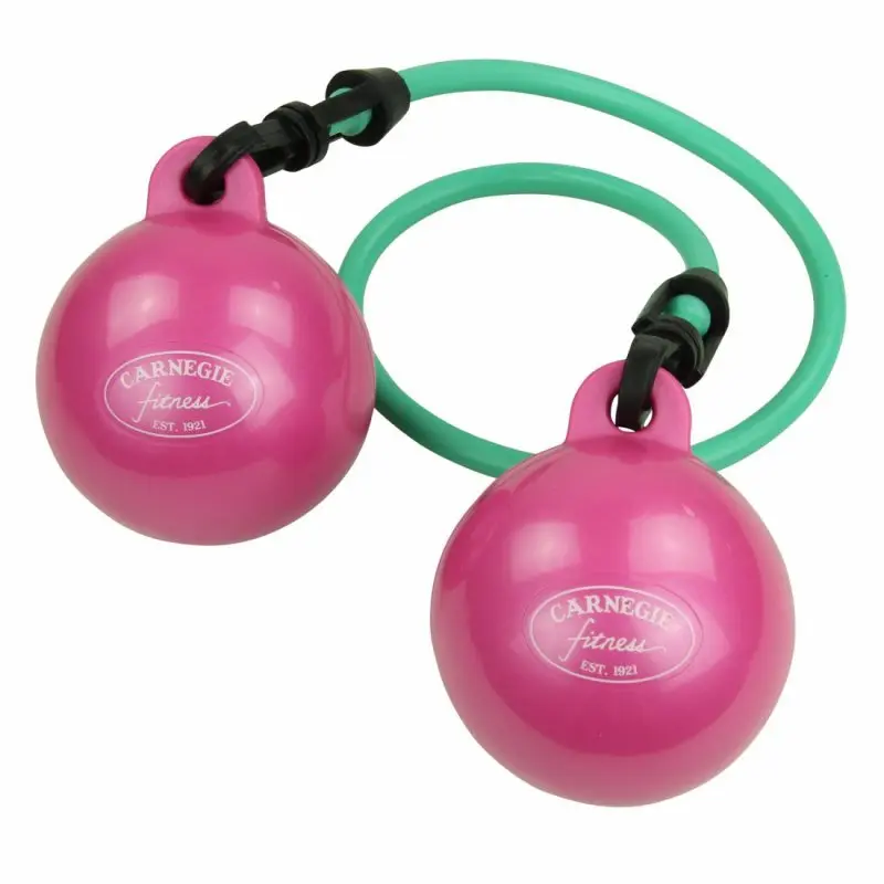 Two pink Carnegie Fitness weighted balls (500g each) connected by a green resistance tube, designed for full-body workouts; product branding visible on each ball. Ideal for strength and toning exercises.