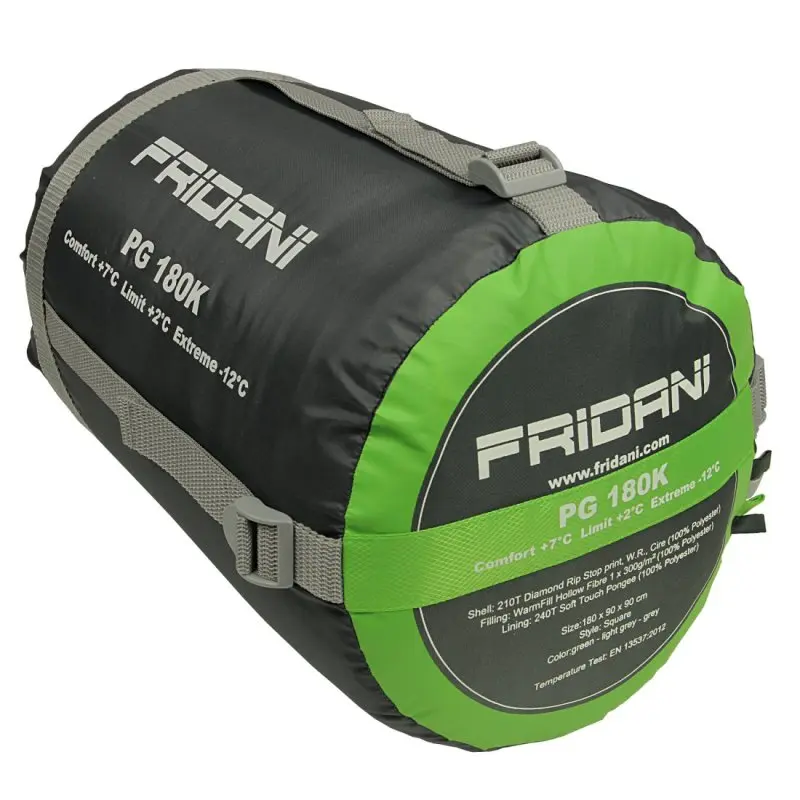 Sacco a pelo Fridani PG 180K compresso in una sacca nera e verde con dettagli tecnici e temperature d’uso stampati sulla superficie.