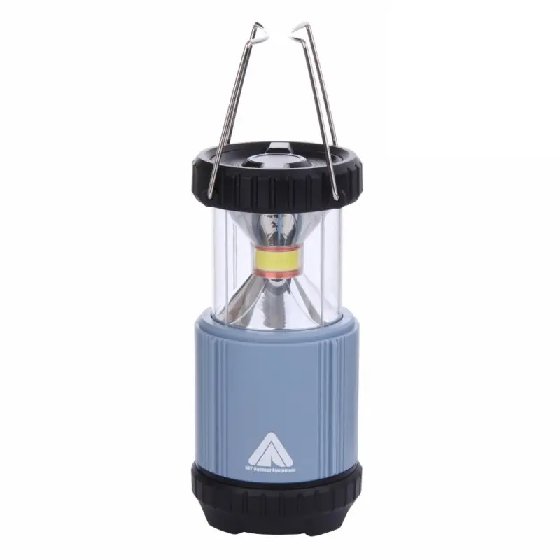 Blue 10T COL 300 camping lantern with 300 lumens, COB LED 5W, cylindrical shape, transparent section, black top and base, metal carrying handle, and 10T Outdoor Equipment logo on the front.