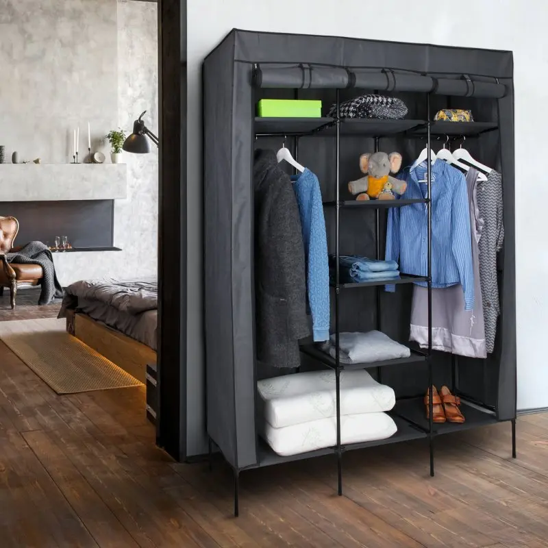 yourGEAR Grado fabric wardrobe 150x45x185 cm in black and grey, featuring 2 clothes rails, 9 shelves, and a roll-up cover, shown organized with clothes, shoes, boxes, and accessories in a modern bedroom.