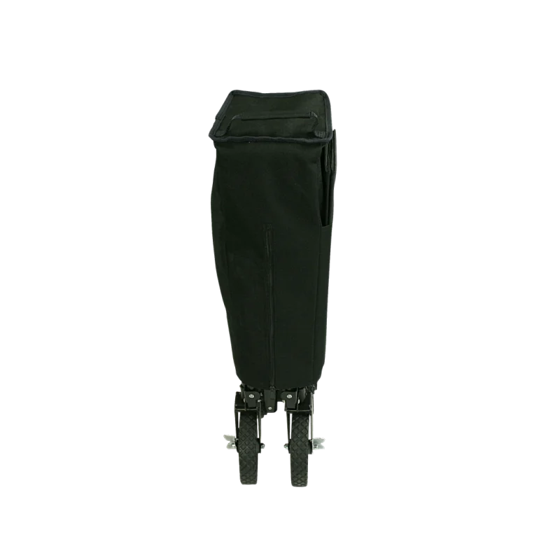 Chariot pliant 10T Foldy Trolley XL noir, compact et vertical, avec roues robustes visible en bas, idéal pour la plage et les sorties en famille, livré avec une housse de transport.
