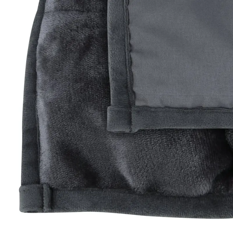 Manta terapéutica yourGEAR Cameri de 6 kg, tamaño 135x200 cm, con exterior de suave felpa gris y costuras visibles, ideal para estimulación profunda y relajación, detalle de textura y acabado en la imagen.