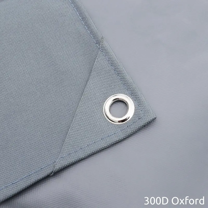 Detail view of yourGEAR Wheel-Cover made of grey 300D Oxford fabric with reinforced edges and metal eyelet, designed for 16/17 inch caravan and camper tires, offering UV 50 protection.