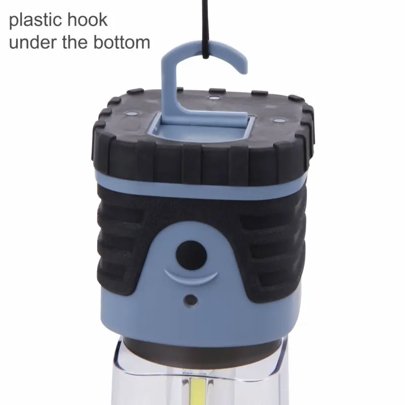 10T HPL 500 camping lantern in blue with black rubber housing, visible plastic hook for hanging, 500 lumen output, 4 COB LEDs, durable design for outdoor use, close-up of the top section.