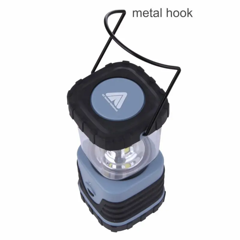 Blue 10T HPL 500 camping lantern with 500 lumens, 4 COB LEDs, 12W power, black rubberized top, transparent body, metal hook for hanging, and rugged design for outdoor use.