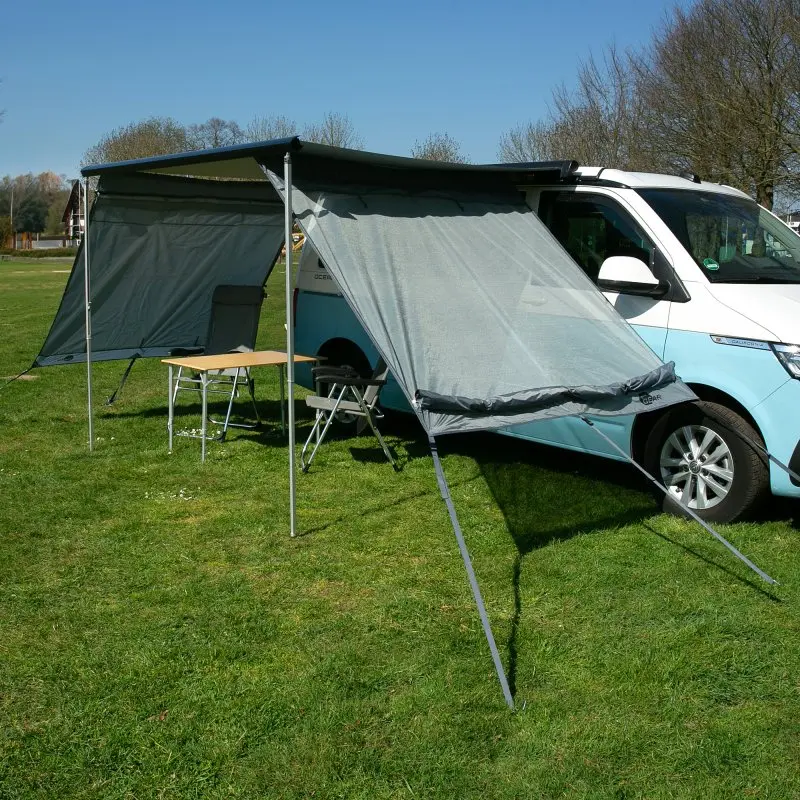 your GEAR Sun + Rain Blocker side walls for campervan awnings, set of 2 grey side panels, attached to awning with 2 m extension, providing sun and rain protection, shown mounted on a white campervan outdoors.
