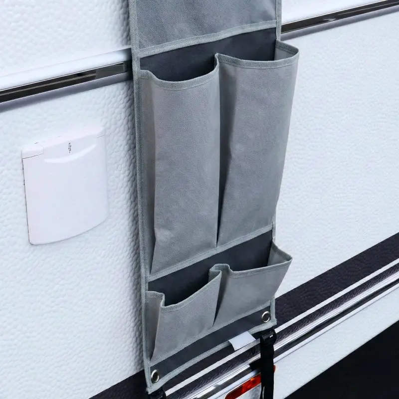 Organisateur de caravaning your GEAR Pocket gris, 140 x 30 cm, suspendu à une paroi de caravane, avec 9 poches de rangement visibles, fixation par œillets et bande, adapté pour camping, tente ou auvent.