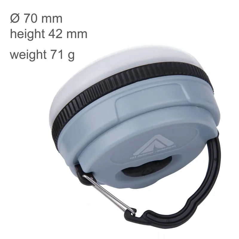 Blue 10T MCL 150 camping lamp with 150 lumens, compact round shape, black edge, built-in carabiner hook, and visible size details: 70 mm diameter, 42 mm height, 71 g weight. Ideal for outdoor use.