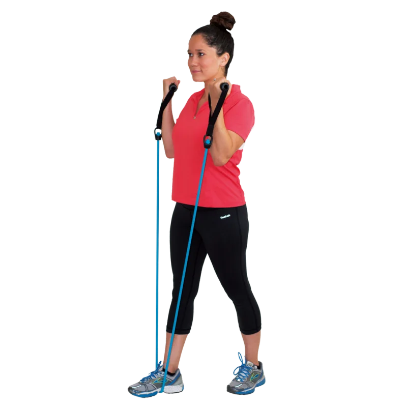 Woman exercising with Spirit Expander Light 9kg resistance band; blue fitness band with black handles, used for strength training at home, gym or outdoors. Ideal for effective resistance workouts.