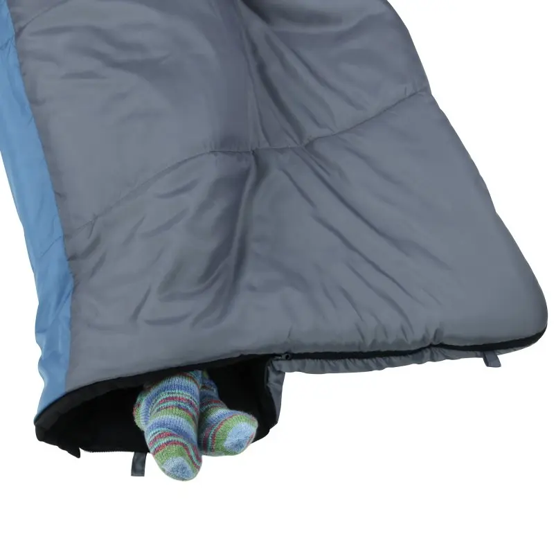 yourGEAR XXL sleeping bag Sumatra, blue and grey, rectangular shape, warm double-layer design, soft cotton flannel lining, feet visible at the opening, suitable for 3-4 seasons, 230x100 cm.
