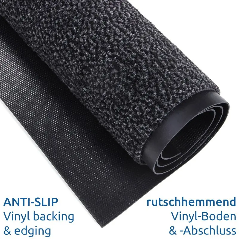 yourGEAR Schmutzfangmatte 60x45cm, dunkelgrau, mit dichtem Velours-Floor, rutschfester Vinyl-Unterseite und Anlaufkante, geeignet für innen und außen, aufgerollt dargestellt.