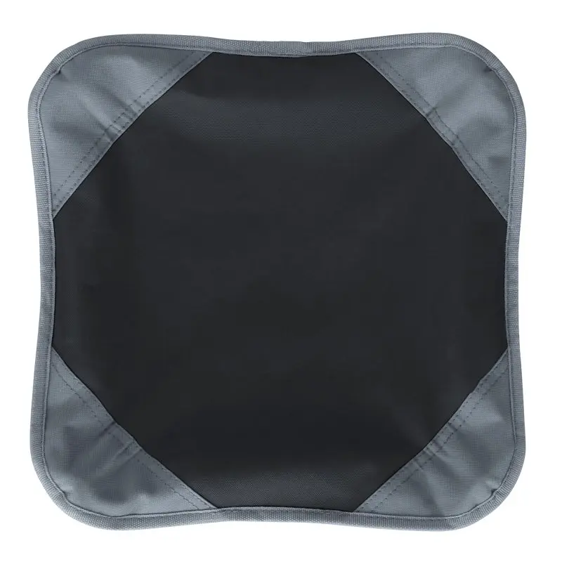 your GEAR camping stool Sesto with a large, square, black seat and reinforced grey corners, designed for stability and durability; suitable for outdoor use and supports up to 120 kg.