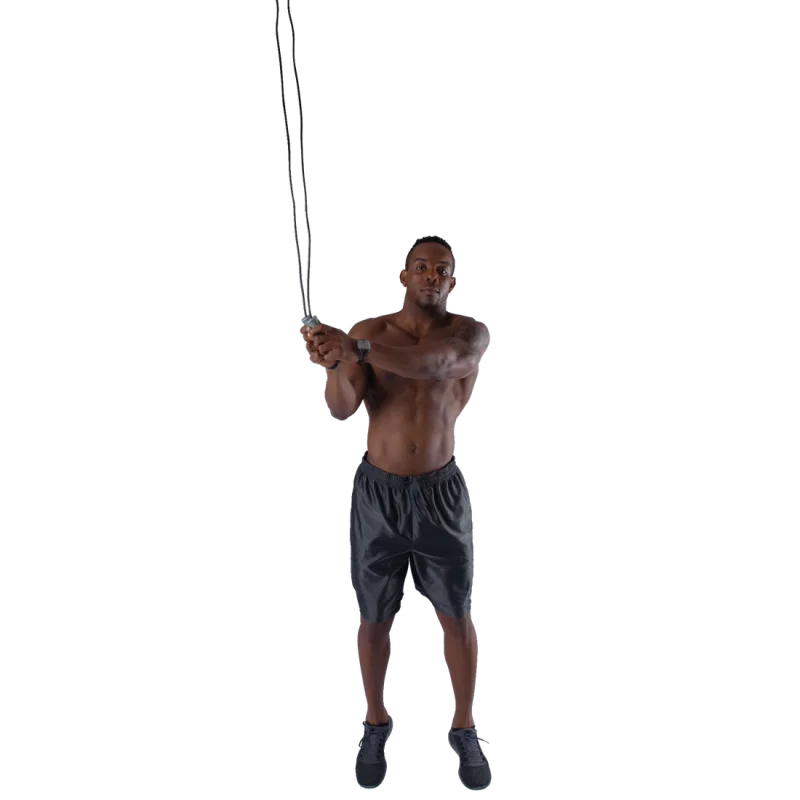 Man using the Spirit Speed Rope fitness skipping rope, shirtless, wearing black shorts and black shoes, demonstrating jump rope exercise for cardio and endurance training. Product for boxing, fitness, and daily workouts.