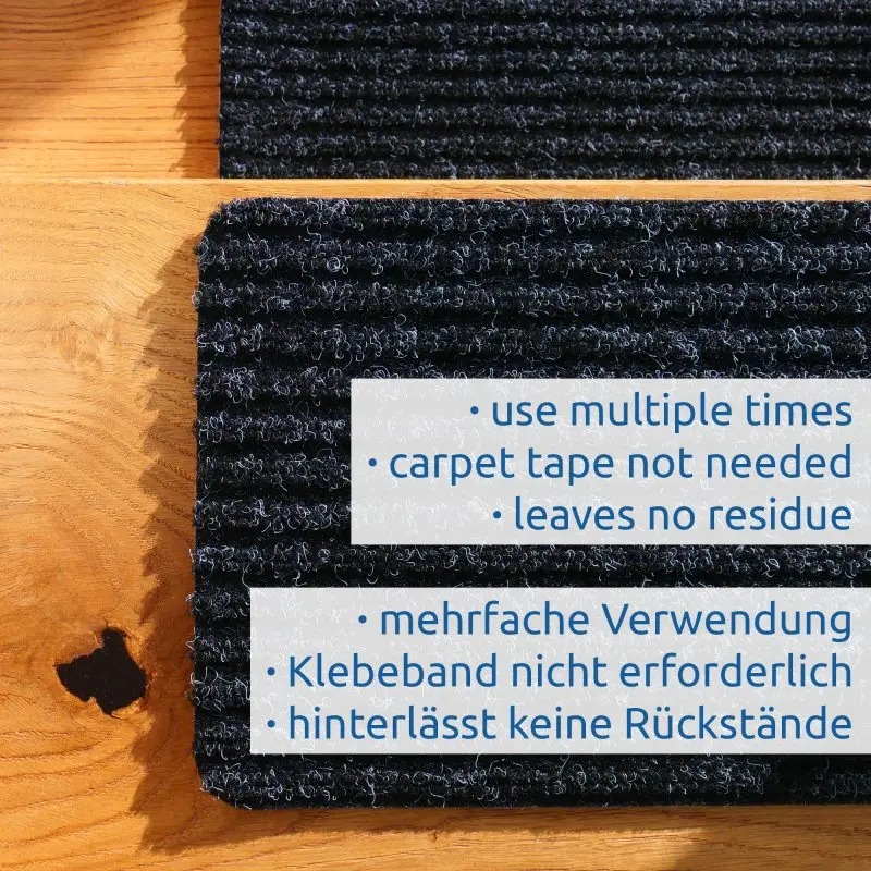 Tapis de marche d’escalier yourGEAR gris foncé 76x20cm, surface antidérapante, réutilisable, avec dessous TPR auto-adhésif, posé sur une marche en bois, sans ruban adhésif, ne laisse aucun résidu.