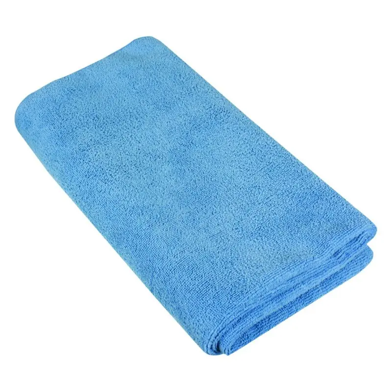 Serviette de voyage Trekmates microfibre bleu 90x40 cm, légère, douce et séchage rapide, idéale pour le camping, la plage ou la randonnée, présentée pliée sans accessoire visible.