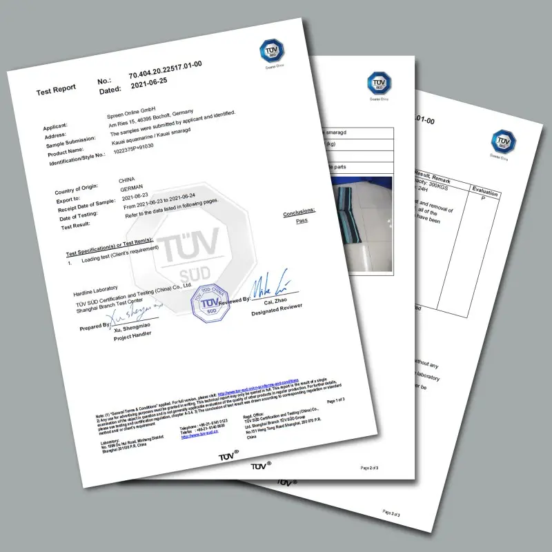 Rapport de test TÜV pour la yourGEAR Kauai Smaragd Hängematte, indiquant la certification de sécurité et la capacité de charge de 300 kg, avec photo de la hamac et documents officiels visibles.