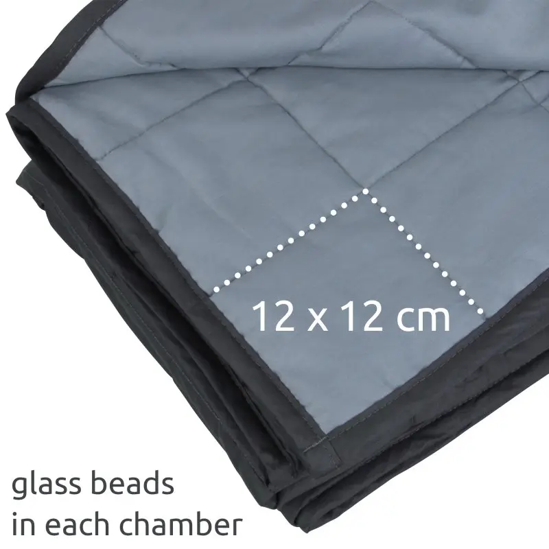 yourGEAR Como 9 kg weighted blanket, 135x200 cm, grey cotton fabric, visible quilted chambers with 12x12 cm sections filled with glass beads for deep pressure therapy.