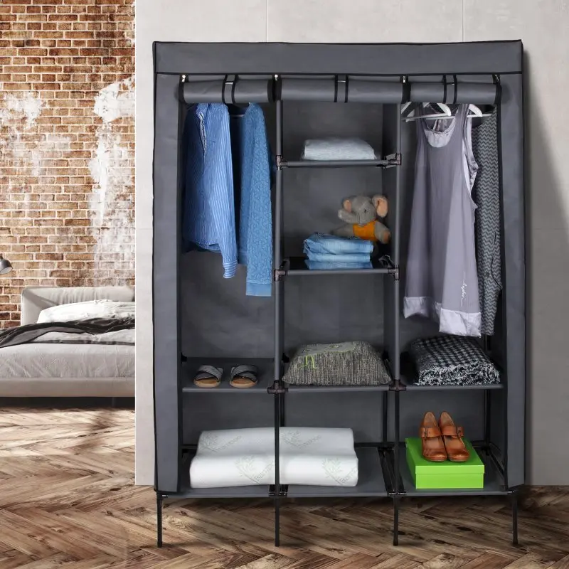 yourGEAR Grado fabric wardrobe 130x45x175 cm in black and grey, with 2 hanging rails and 4 shelves, shown with clothes, shoes, and accessories neatly organized for storage. Modern, sturdy foldable closet.