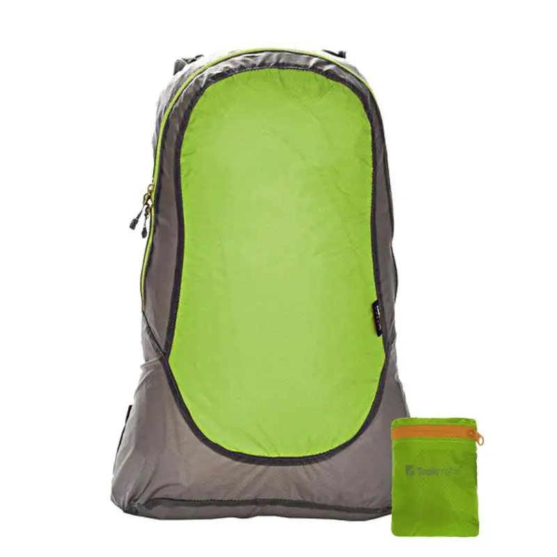 Lightweight Trekmates Daypack 20L hiking backpack in grey and bright green nylon, shown with matching compact pouch, foldable and waterproof, ideal for travel, camping, and outdoor activities.