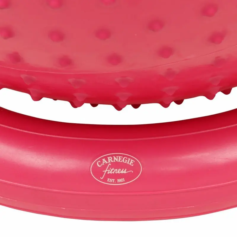 Red spiked Carnegie Massage Ball with bagel-shaped base, made of durable material, suitable for self-massage and fitness exercises. Visible Carnegie Fitness logo on the base. Diameter 65 cm.