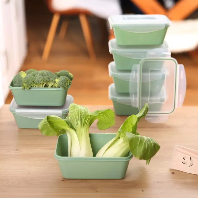 6er Set your GEAR Pila Frischhaltedosen à 1000 ml, grün, mit transparenten Deckeln, stapelbar, BPA-frei, für Kühlschrank, Gefriertruhe und Mikrowelle, einige Dosen gefüllt mit Gemüse.