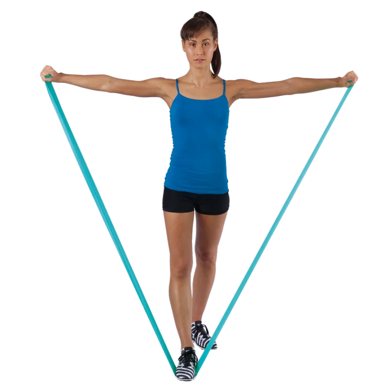 Woman exercising with a turquoise Spirit Fitnessband, 183x10 cm, latex-free, 13.5 kg resistance, stretched between hands and under one foot; suitable for versatile strength and rehabilitation training.